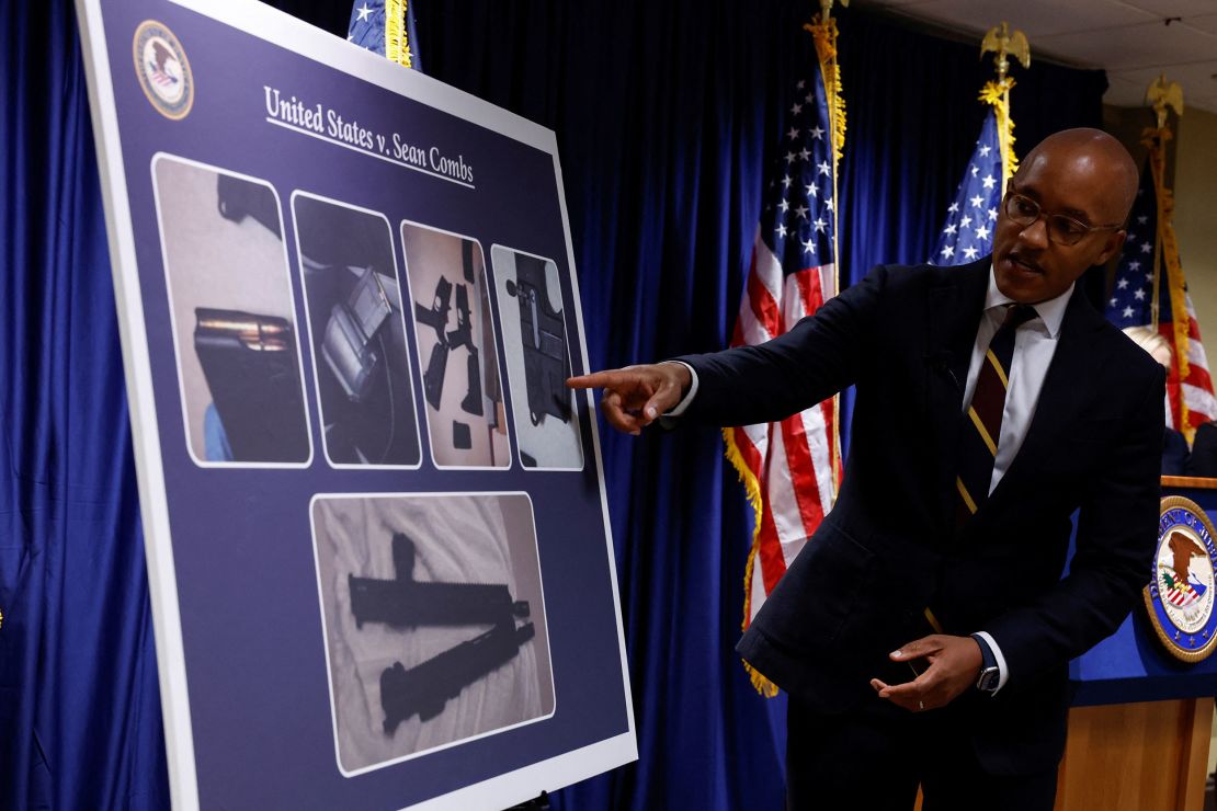 US Attorney Damian Williams pointed at a chart Tuesday showing the firearms seized during the search of Sean "Diddy" Combs' homes.